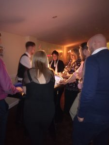 Guests playing at casino tables at a private party