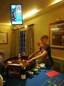 Roulette table and live display screen in a hotel function room