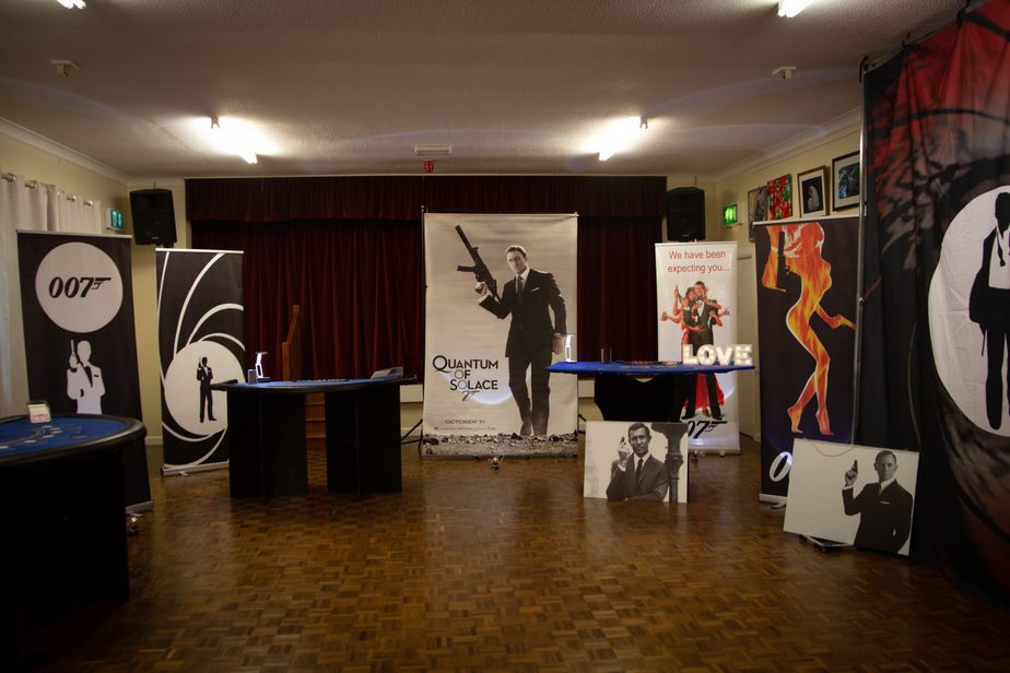 James Bond themed casino night set-up with 007 banners