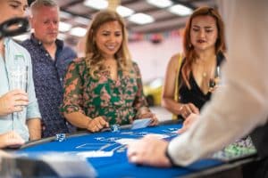Guests watching the cards at a blackjack table