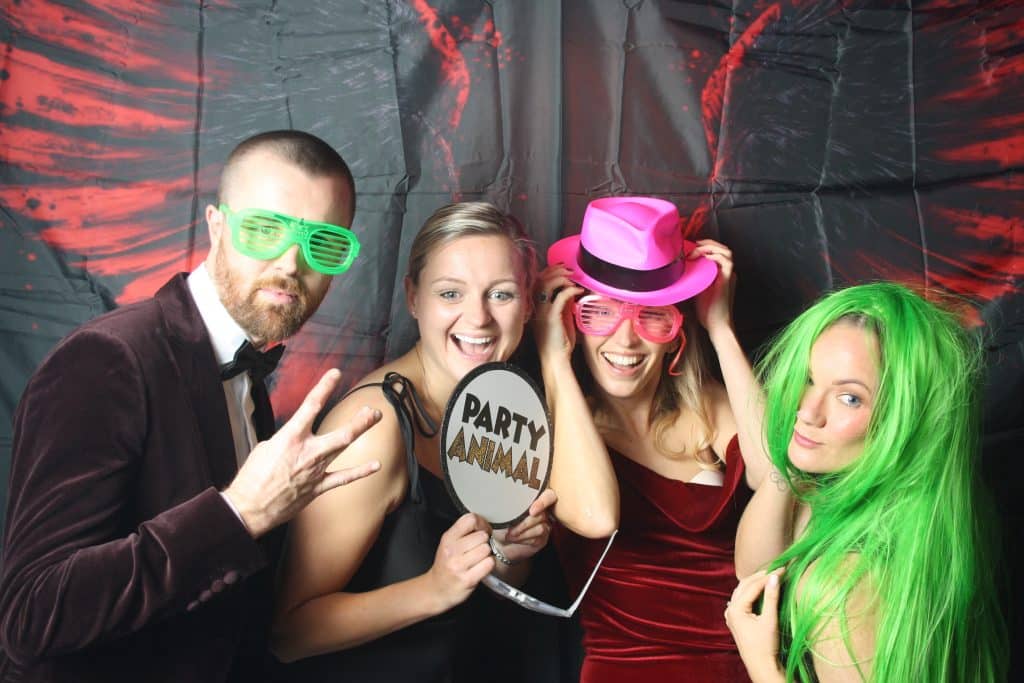 40th birthday party guests enjoying the photo booth experience